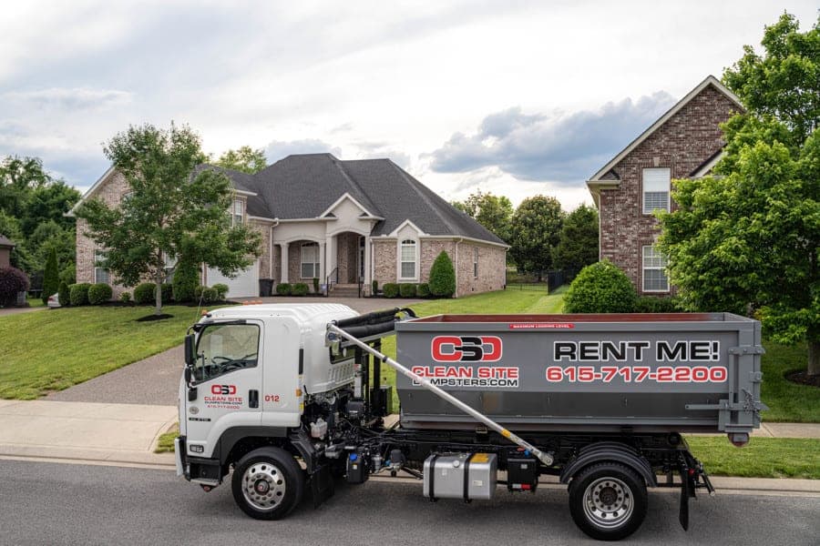 Residential dumpster rental in Nashville driveway